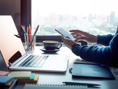 Work phone on a desk for business messaging